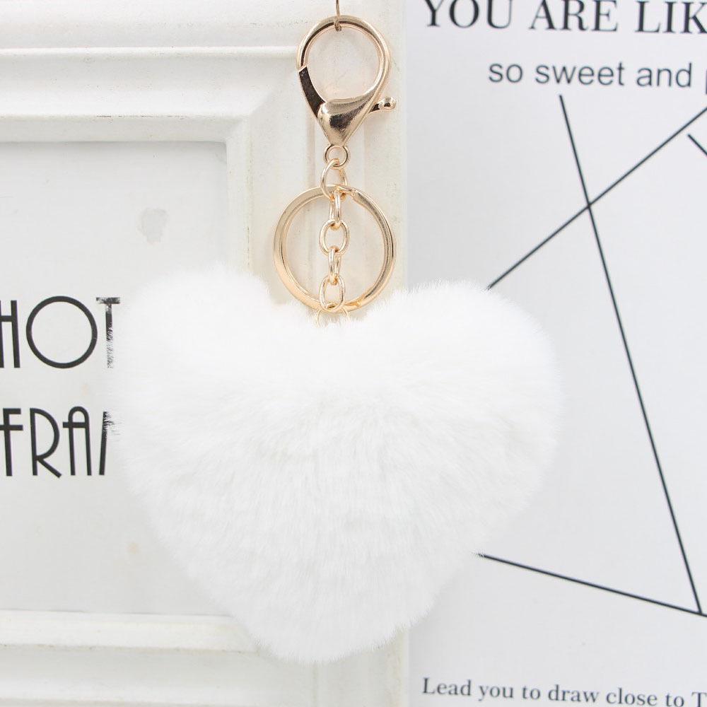 "Charming Heart-Shaped Rabbit Fur Keychain - Fashionable Fluffy Accessory for Ladies' Bags"