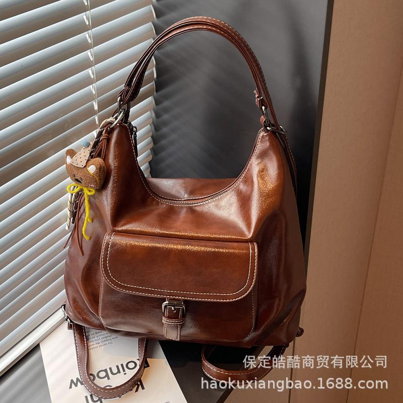 Повседневная вместительная ретро-сумка женская 2025 новая универсальная сумка через плечо рюкзак на два плеча сумка-ведро для поездок