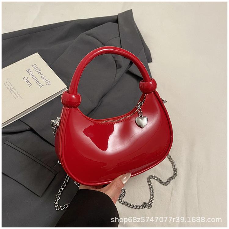 Hand Carry Fashion Trend Dumpling Bag Women 2025 New Simple Versatile Patent Leather Shoulder Bag Niche Design Messenger Bag