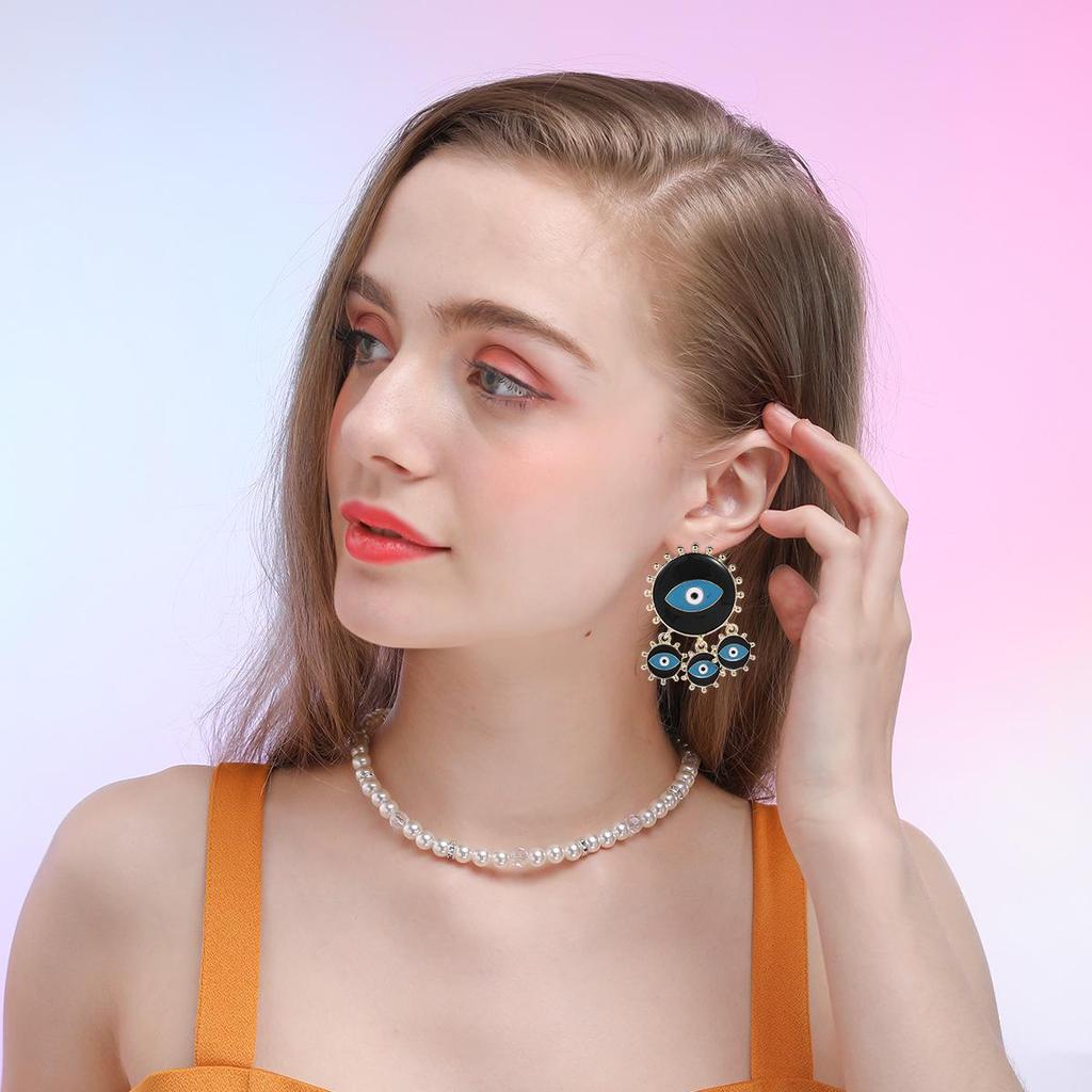 Devil's Eye Drip Oil Alloy Earrings: Trendsetting European & American Street Style
