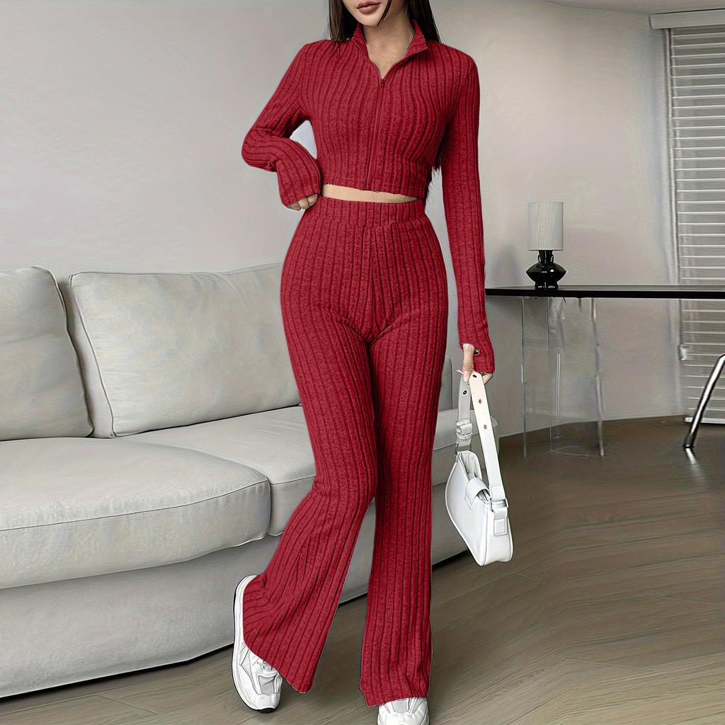 Женский модный однотонный ребристый костюм из двух частей с застежкой-молнией, коротким топом с длинными рукавами и расклешенными брюками с высокой талией