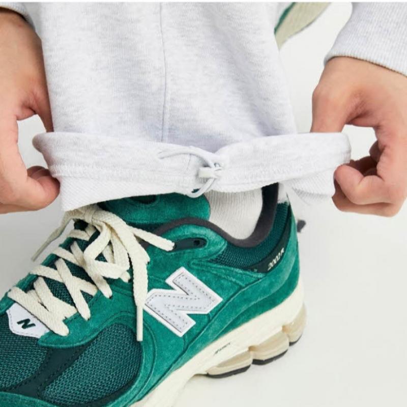 New Balance Брюки Lqj Nbmle11213 16 Широкие брюки для общественного спортивного клуба