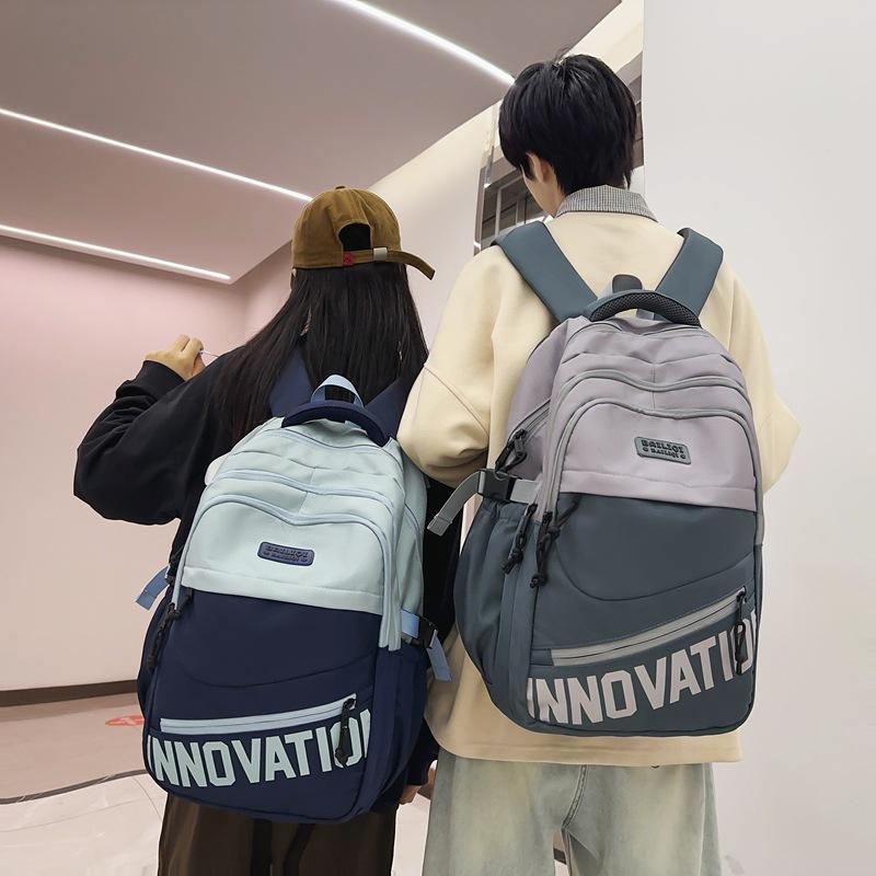 Schoolbag air cushion pallet backpack high-end junior high school students leisure travel couple college students thick wear-resistant dirt-resistant