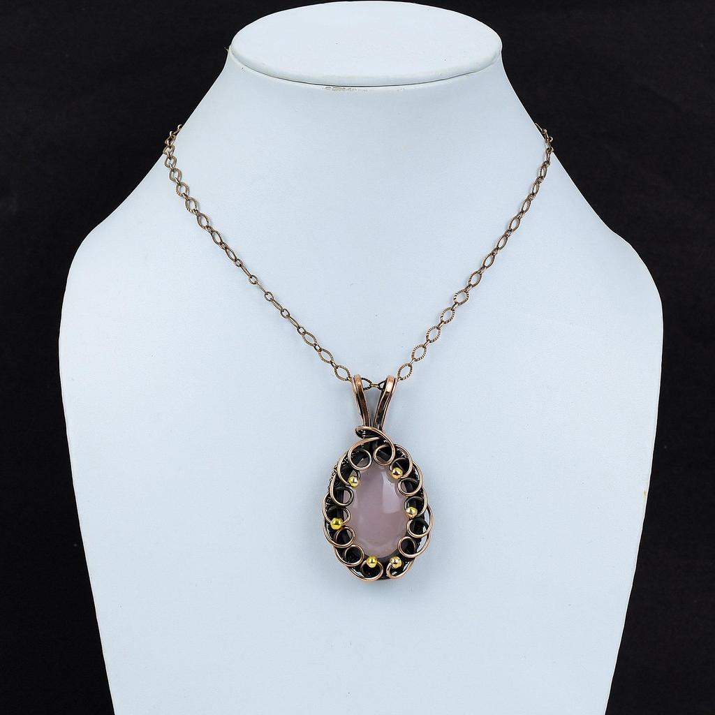 Розовый кварц Драгоценный камень Чистая медная проволока Обернутая ювелирная подвеска ручной работы