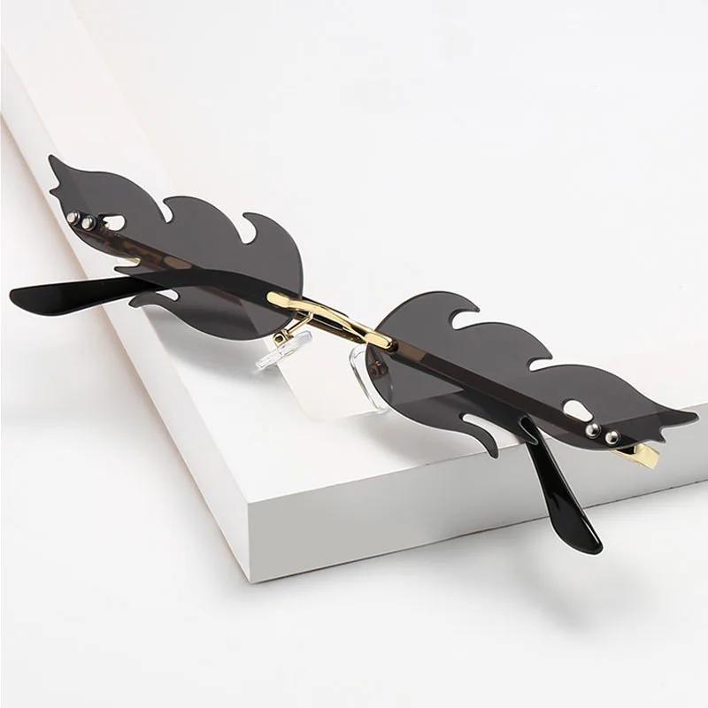 Fashion Style Oval Fire Flame Sun Glasses Woman Metal Material Rimless Sun Eyeglasses Female Small Glasses Frame Ocean Mirror Luxury Design Oculos