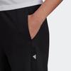 adidas Трикотажные спортивные штаны женские черные HE0419