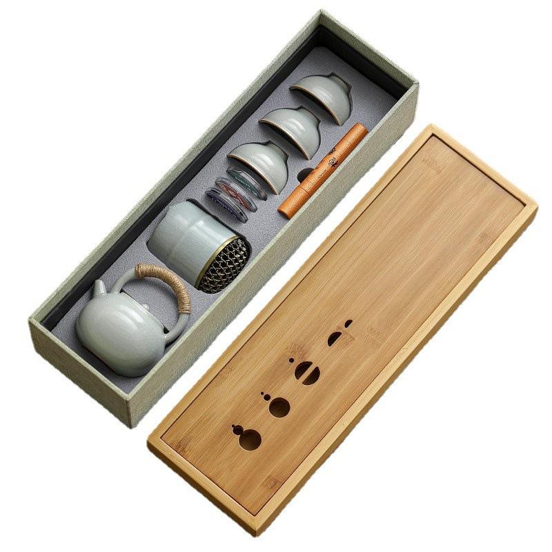 Dehua travel kung fu tea set small set household simple teapot ceramic teacup outdoor tea tray portable bag