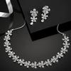 Rhodium Plated Silver Toned White American Diamond Studded Flower Shaped Jewellery Set For Girls and Women