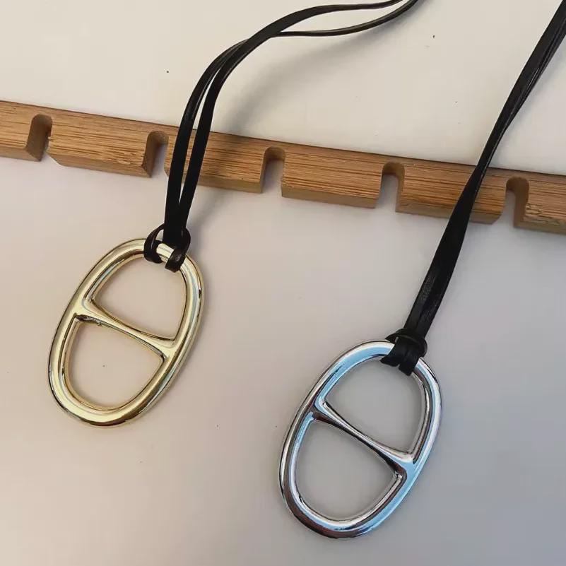 European and American Pig Nose Pendant Leather Necklace - Fashionable, Simple, All-Match Long Sweater Chain for Women