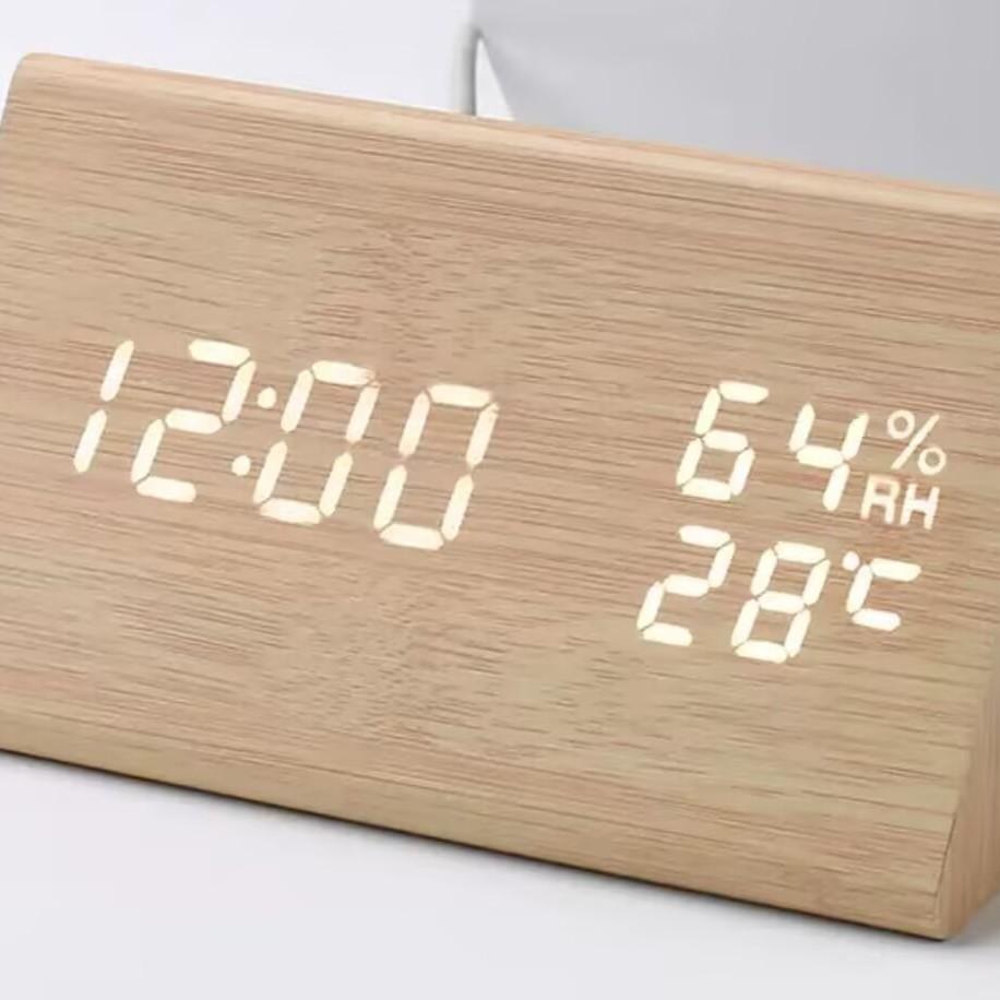 Creative triangle temperature and humidity LED wooden clock desktop silent voice-activated electronic clock multi-function digital alarm clock