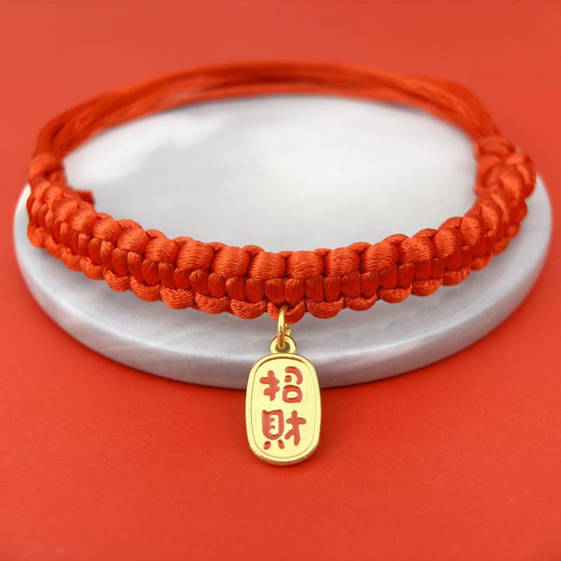 Traditional Chinese-style pet collar with a lucky red string and bell, a festive pet neck accessory for cats and dogs during the Spring Festival