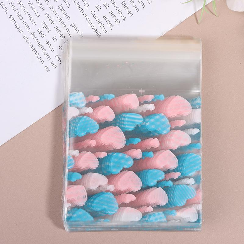 100 шт., прозрачный мешок для конфет в форме сердца, пластиковый пакет для печенья и закусок, упаковка для украшения выпечки, самоклеящаяся сумка