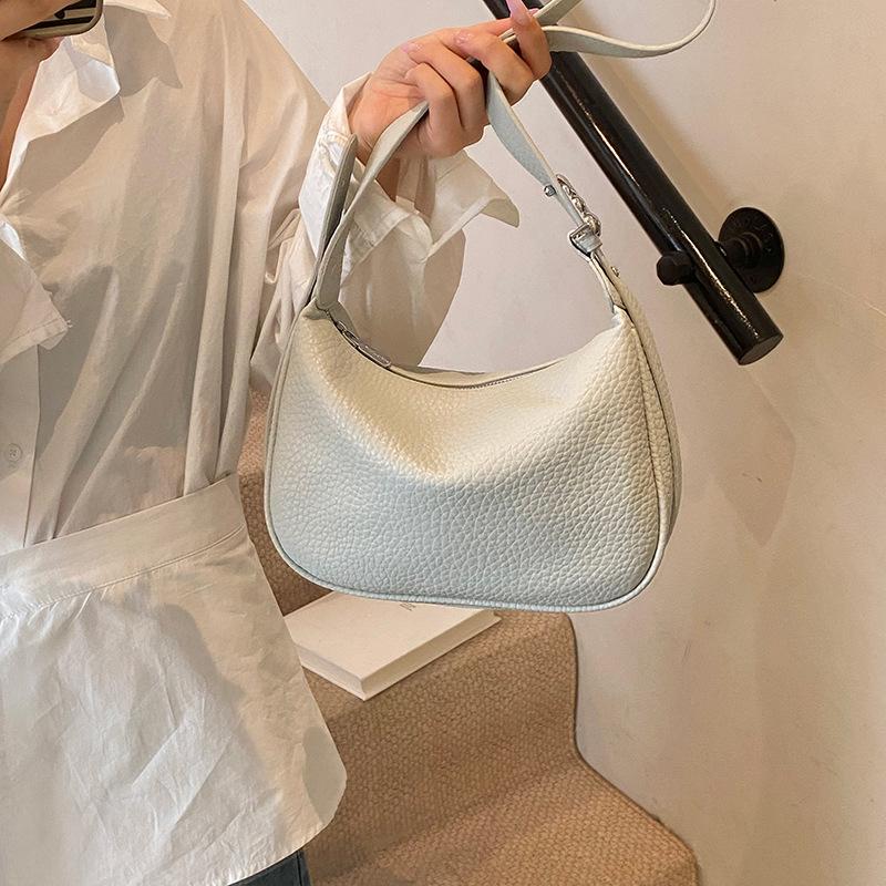 Супер огненная нишевая сумка-рожок женская 2025 новая весна и лето универсальная сумка-мессенджер модная на плечо подмышку сумка-пельмень