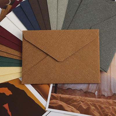 Набор для любовных писем с ретро льняной текстурой: Треугольные конверты в западном стиле со специальным хранилищем