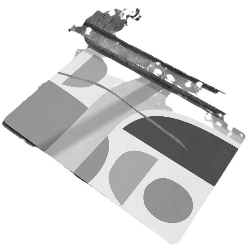 Коврик для ванной комнаты с геометрическим узором серого цвета — нескользящий, устойчивый к грязи и износу, простой в уходе. Идеально подходит для входов в скандинавском стиле.