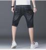 Popular Men's Cropped Four-Season Trousers: Elastic, Mid-Waist, and Trendy 7-Point Regular Denim for Youthful Style