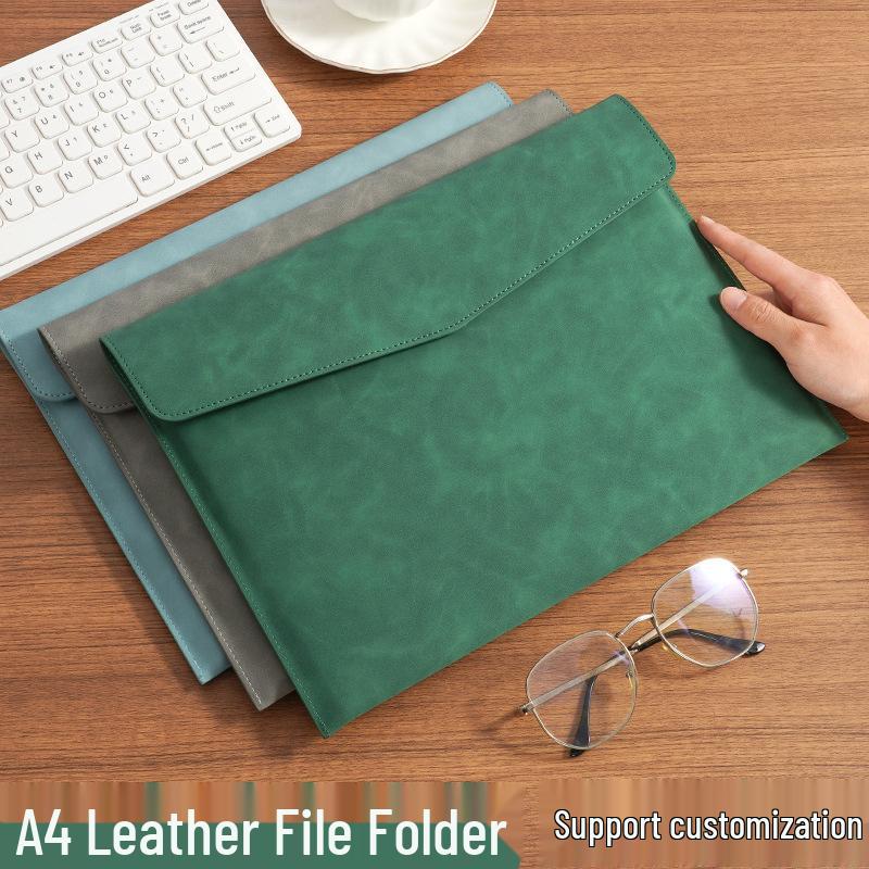 Кожаная папка для документов формата А4: Решение для хранения договоров и протоколов совещаний в бизнес-офисе