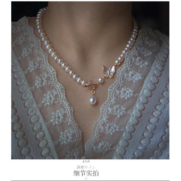 Designer-style necklace featuring natural freshwater pearls and a near-round, mother-of-pearl butterfly pendant 14k Gold-plated Sweet necklace with a