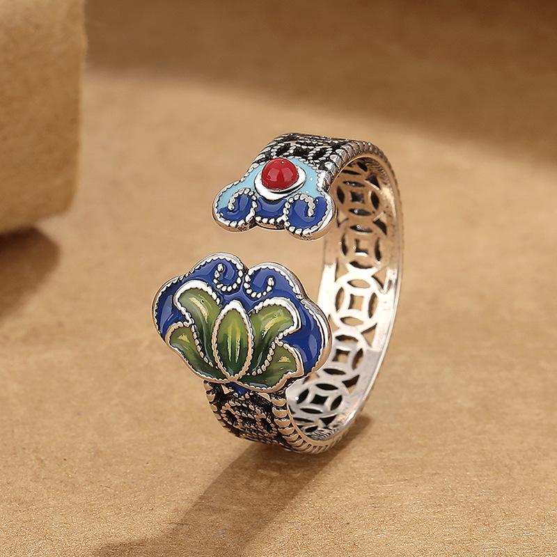 Ретро полый национальный прилив Lotus Lotus Ruyi медное кольцо для монет женский национальный процесс тикания ветра открытие может регулировать Handdi