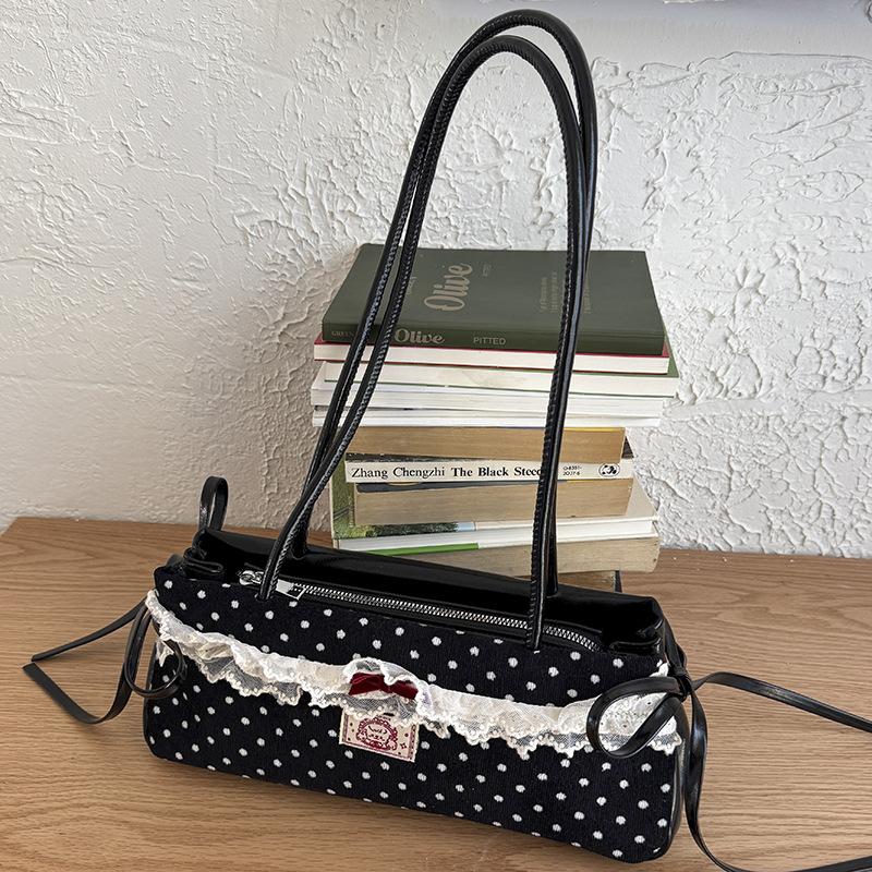 Летняя новая портативная наплечная сумка, высокая ценность, маленькая сумка в черно-белый горошек, модная сумка для通勤 для женщин