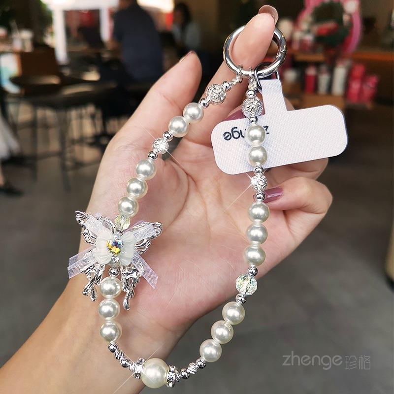 High-end gemstone butterfly pearl mobile phone chain ins fashion women's wrist pendant beaded chain short style
