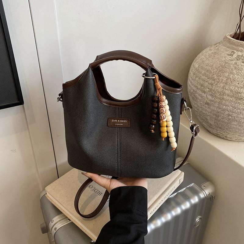 Премиальная женская сумка 2025 новая модная дорожная сумка на плечо, повседневная универсальная сумка-мессенджер, сумка-ведро