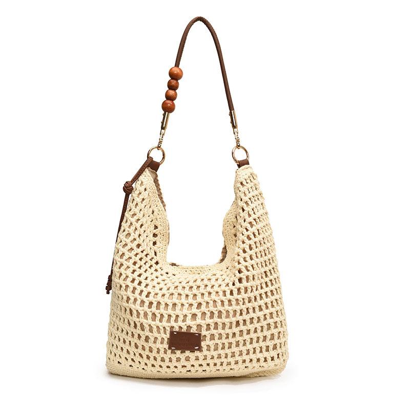 Woven hollow bag women's 2025 new spring and summer seaside vacation travel tote bag beach bag shoulder armpit bag
