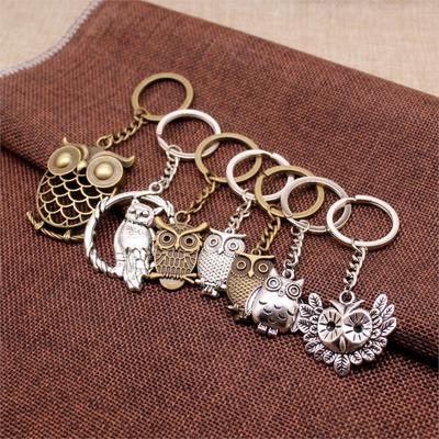 Брелок с металлической подвеской в виде совы