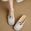 Woven Hollow Flat-soled Sandals Breathable Soft Leather Inner Heightening Characters with Flower Bag Head Half Slippers Women's Summer Wear