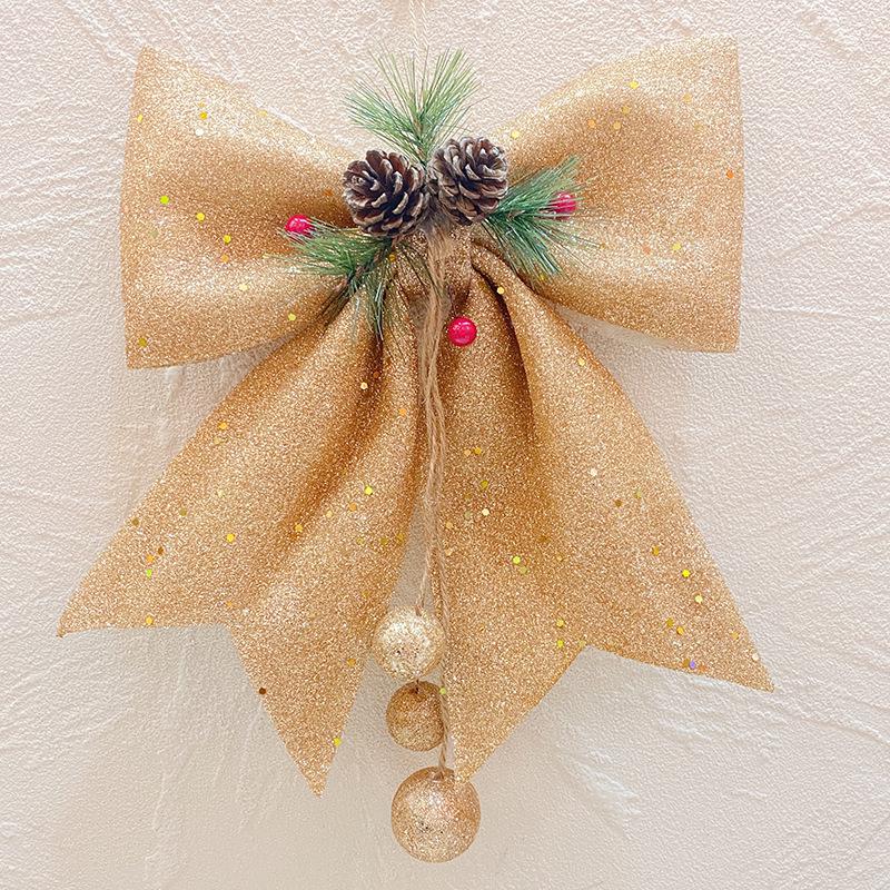 Золотой блестящий бант с украшениями: Большое, разноцветное рождественское украшение в виде елки