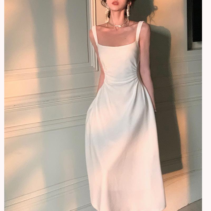 Милое и модное женское летнее платье с заниженной талией и тонким французским платьем на бретельках. Женская юбка-трапеция.