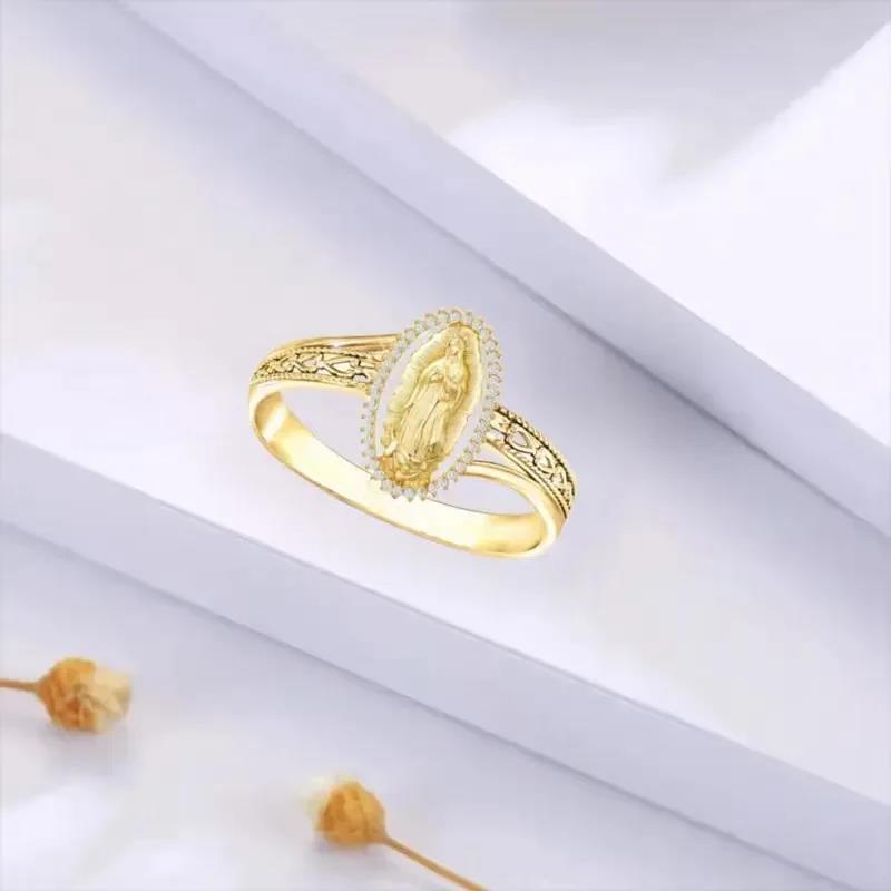 Elegant oval-shaped gold ring with diamonds surrounding the image of the Virgin Mary versatile and elegant