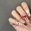 Новогодний маникюр Чистое ручное ношение Накладные ногти Ручная работа Расписной гипс Французский Винно-красный Новогодний маникюр Бант