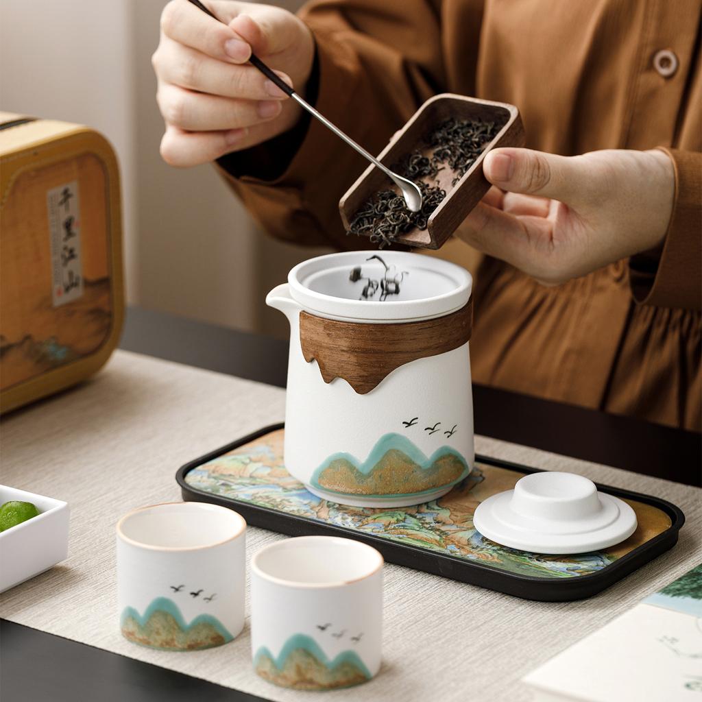 Qianli Jiangshan Ceramic Tea Set Handbag Convenient Outdoor Travel Hand Grab Pot Household Gift