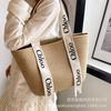 Woven straw bag women's large capacity 2025 new versatile seaside shoulder bag beach vacation commuter tote bag