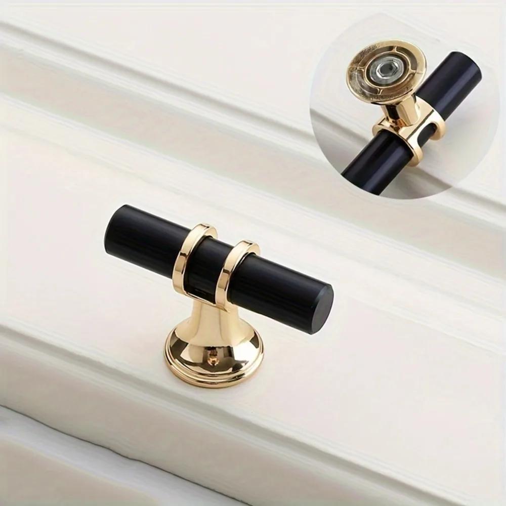 10pcs Elegant Black and Golden Cabinet Knobs - Polished Metal Drawer Pulls with Secure Mounting Screws, Perfect for Home Decor.