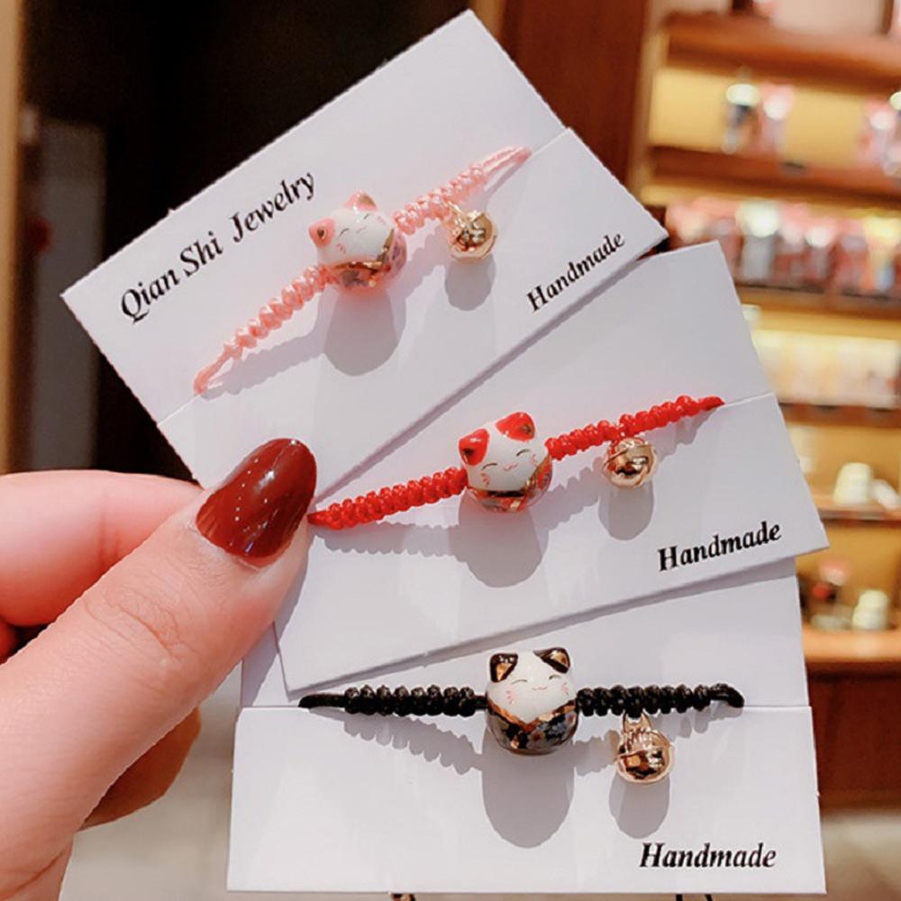 Регулируемый браслет ручной работы из красной плетеной веревки и ниток для женщин и девочек, керамический браслет с кулоном в виде кошки на удачу, ювелирные изделия в японском стиле