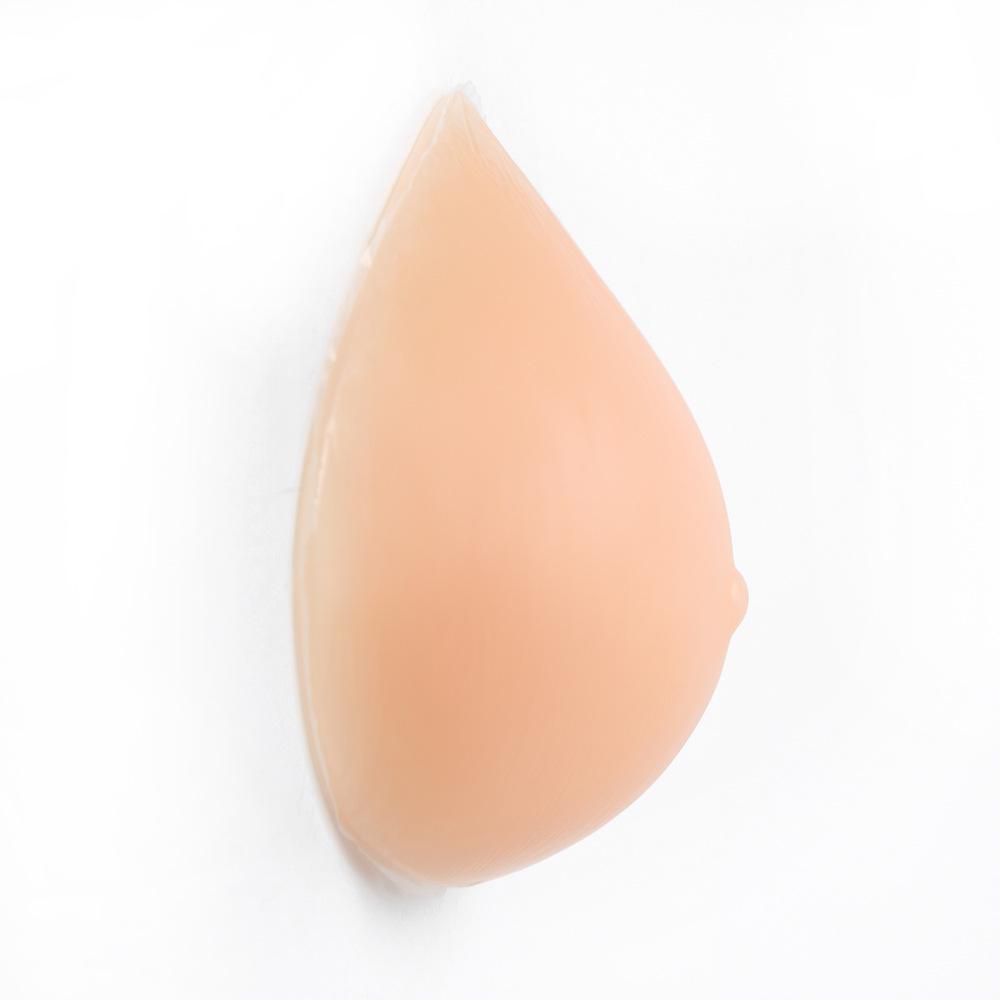 Треугольный силиконовый протез груди в тон кожи - послеоперационная вогнутая накладка на грудь