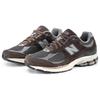 New Balance 2002R Лунный Новый год — кроссовки унисекс Rich Earth коричневого цвета с черным верхом Castlerock M2002RLY