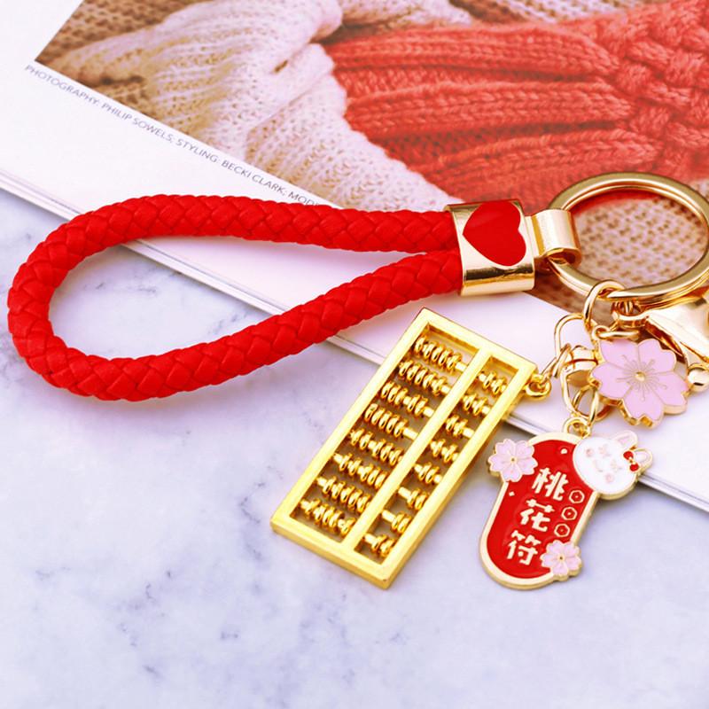Charming Keychain Featuring Lucky Feng Shui Abacus For Special Occasions