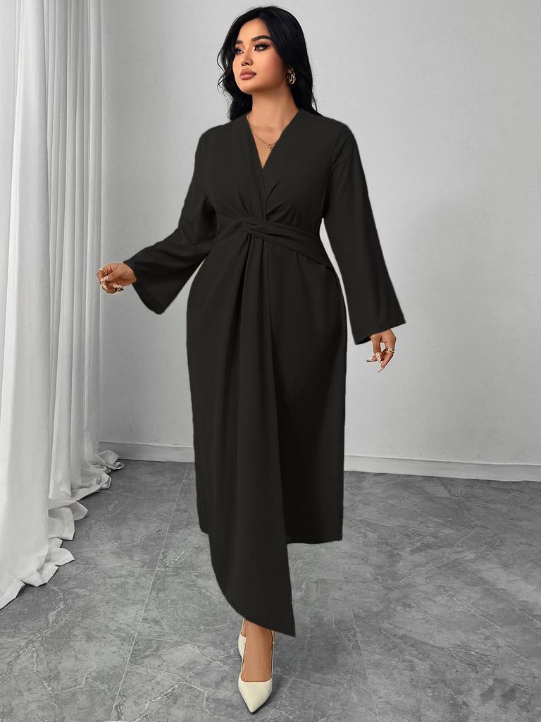 Элегантное облегающее платье с длинными рукавами, подчеркивающее талию, с асимметричным подолом