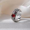 Lucky Money Toad Women's Adjustable Garnet Pixiu Ring with Six-Syllable Mantra for Wealth and Protection.