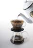 Кофейная воронка Kalita серии Wave, которая позволит вам наслаждаться процессом заваривания. Стеклянная воронка для 2-4 человек. Изготовлена из стекла. Оборудование для воронки черного цвета.