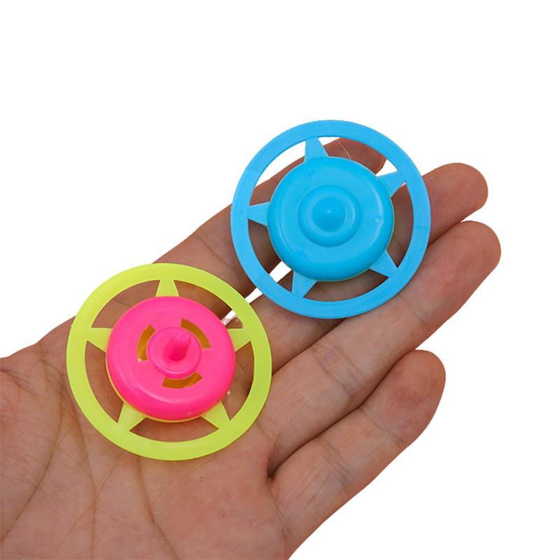 Plastic Spin Gyroscope Toy For Children With Colorful Candy Design And Traditional Play Use