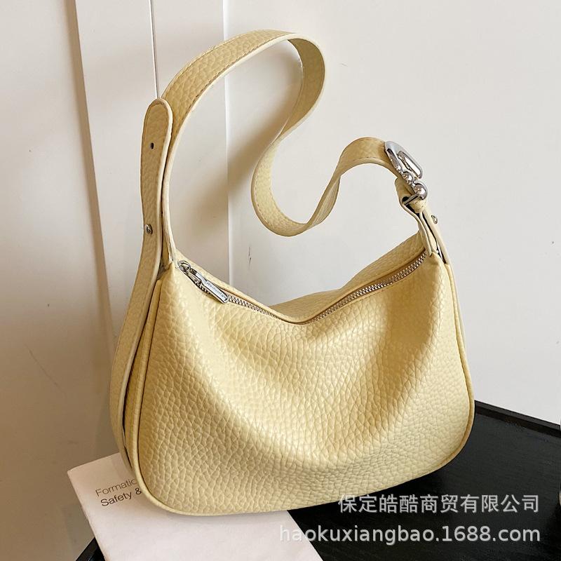 Супер огненная нишевая сумка-рожок женская 2025 новая весна и лето универсальная сумка-мессенджер модная на плечо подмышку сумка-пельмень