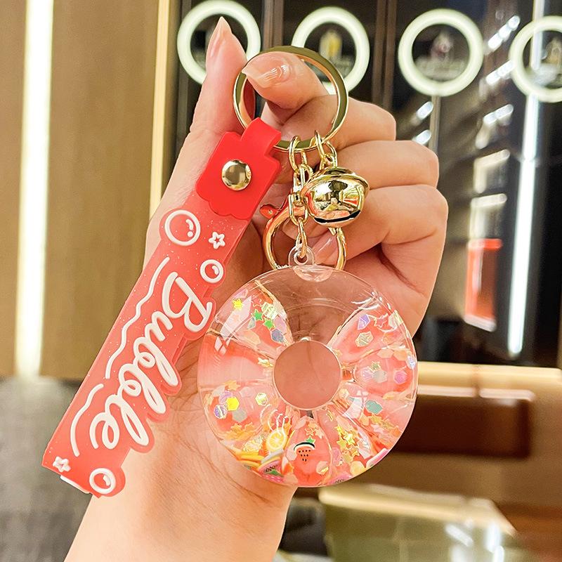 Luminous Oil-Filled Donut Quicksand Keychain: Exquisite Car Pendant & Bag Accessory, Ideal for Gifts.