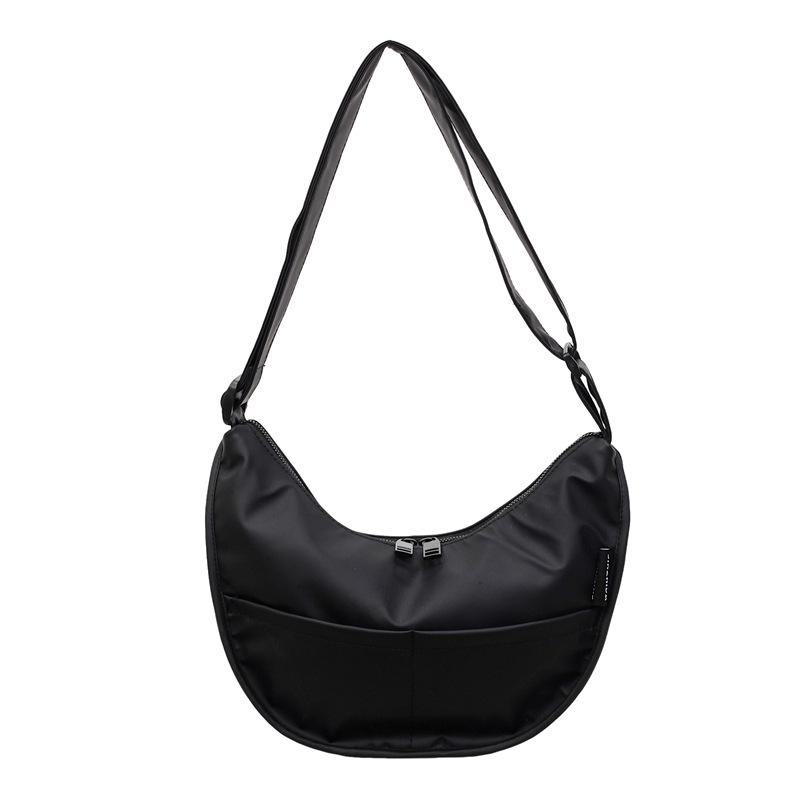 Сумка-пельмень, корейская версия модной нишевой женской сумки через плечо для通勤, японская однотонная маленькая свежая новая повседневная сумка кроссбоди