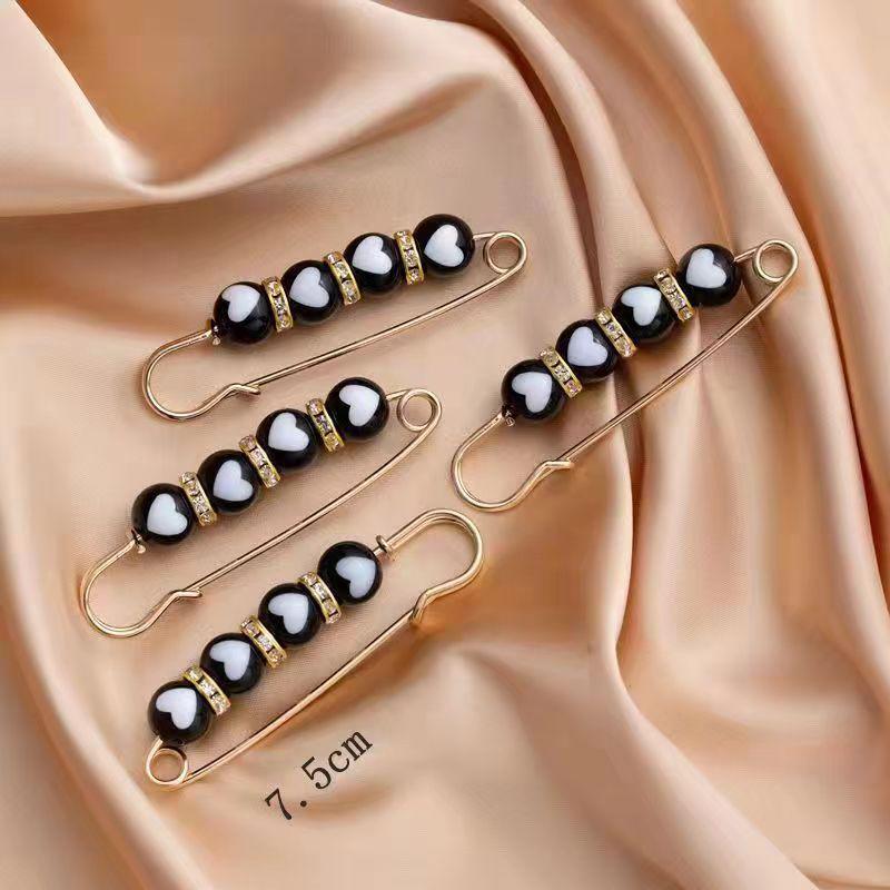 Стильная булавка для пояса с декоративными бусинами для женщин - Надежно фиксирует одежду и предотвращает оголение