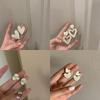 Autumn & Winter Milk White Large Stud Earrings: Cold Style, Sweet Design for Round Faces – 2025 Collection