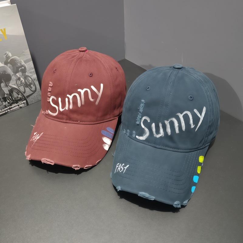 Soft top baseball cap women's sunscreen cap men's new spring and summer hole painting letters fashionable and versatile
